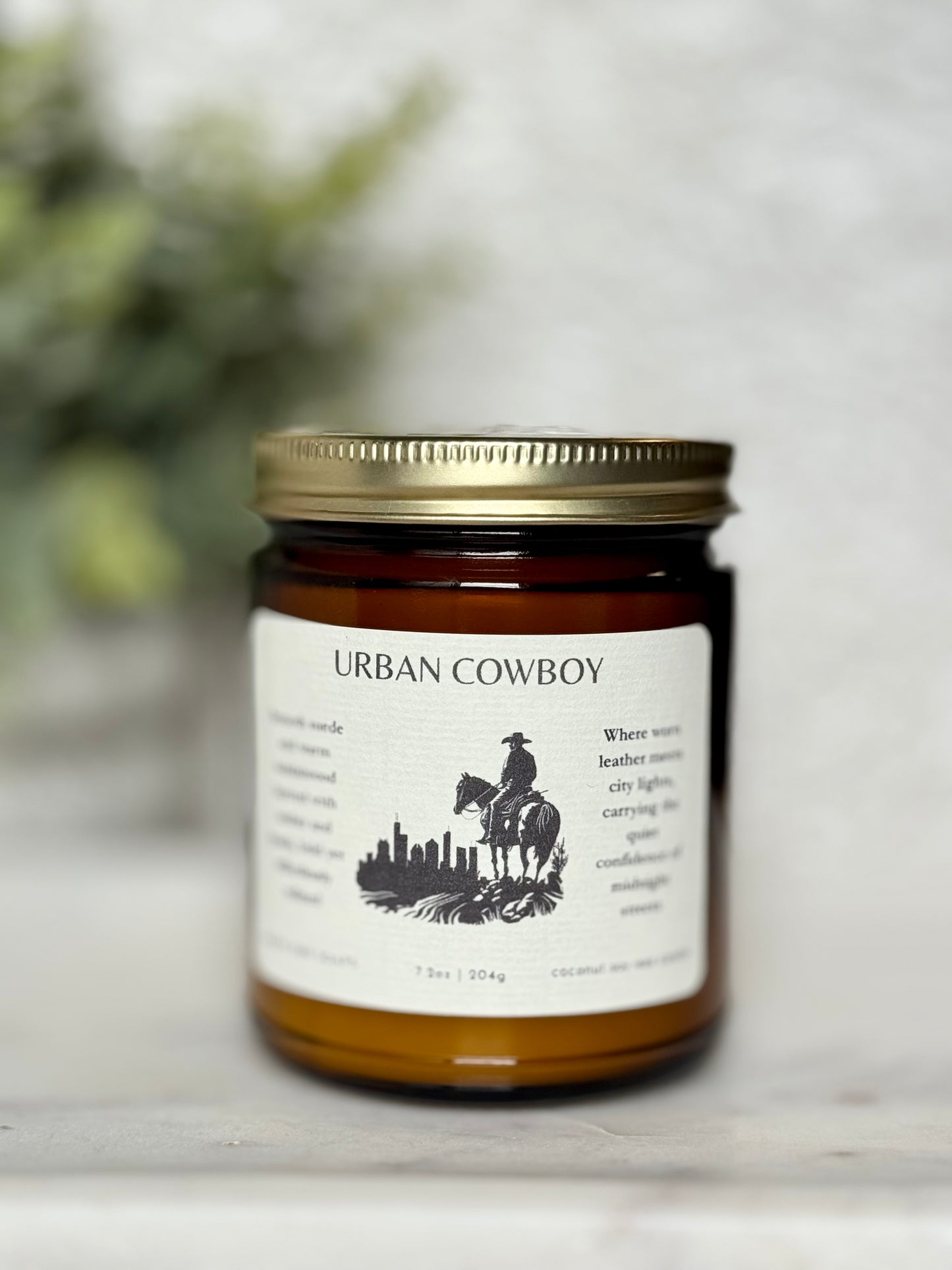 Jar of Urban Cowboy product on a light background