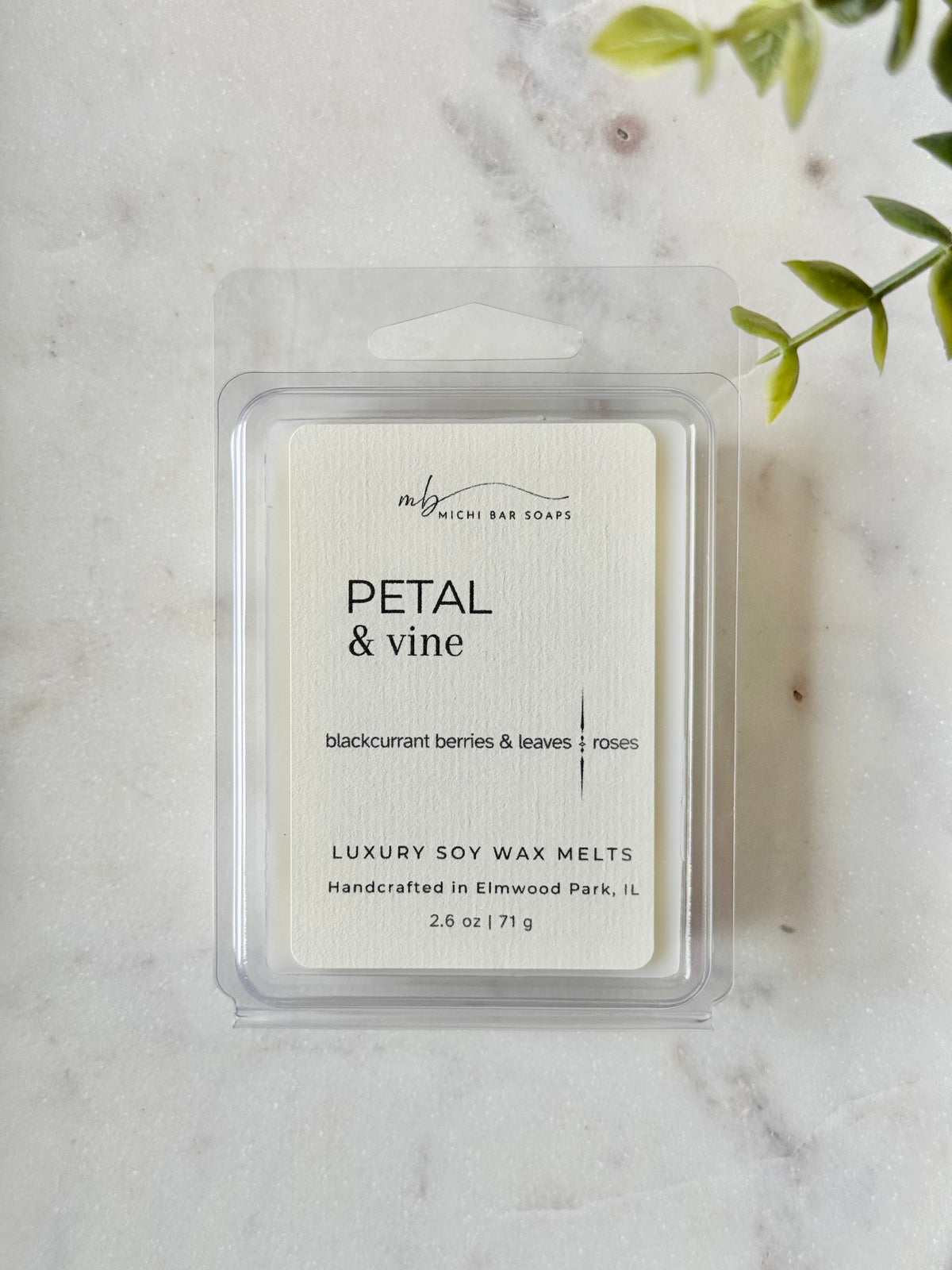 plastic clamshell filled with wax