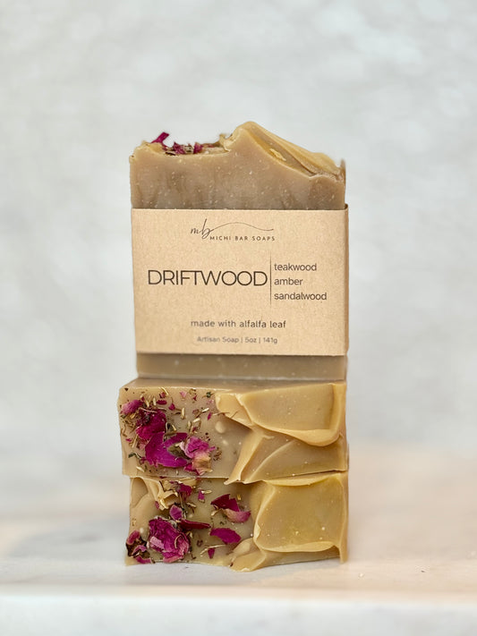 Two bars of soap with a visible brand label on a light background