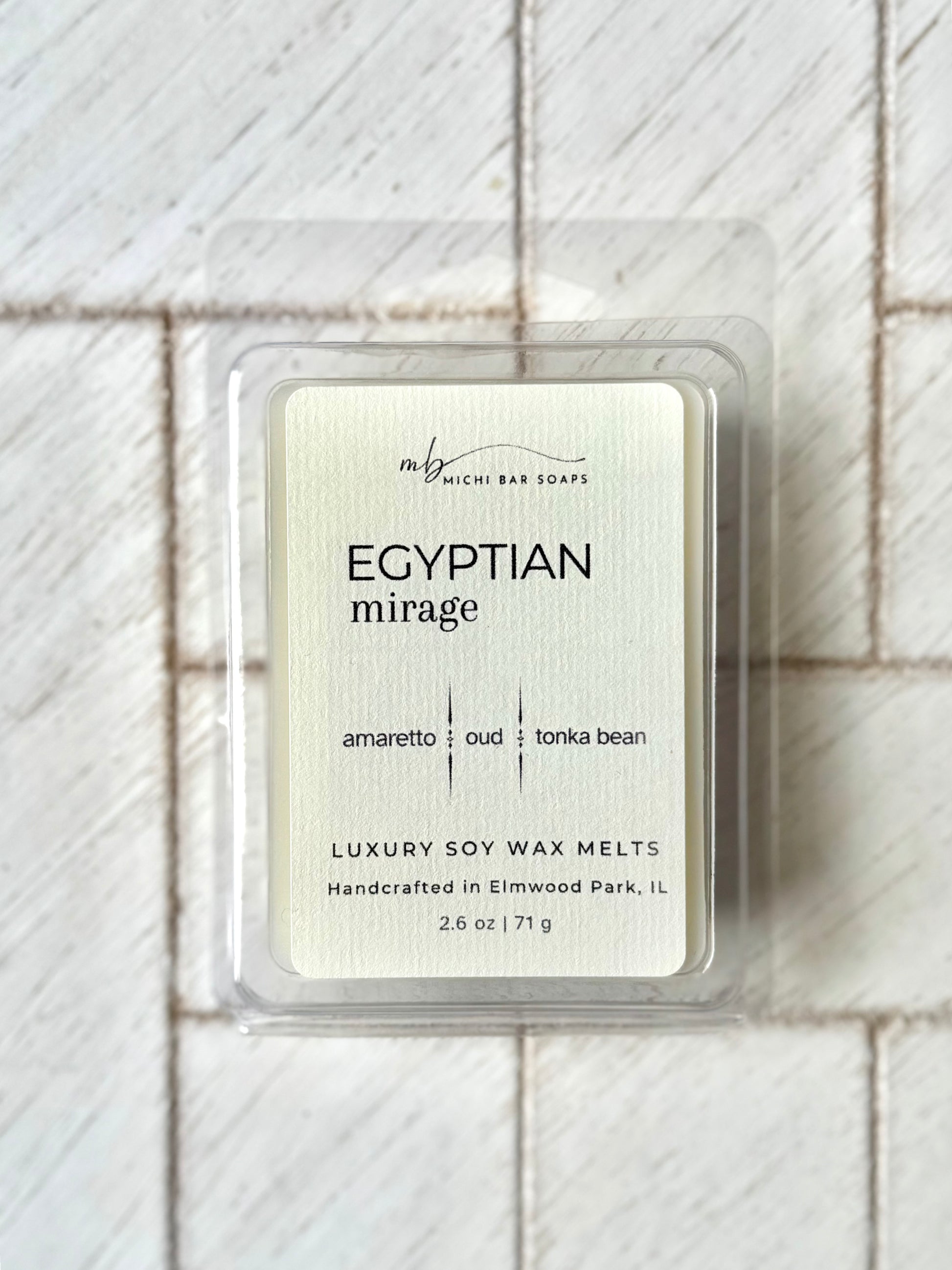 A package of 'Egyptian Mirage' wax melts by michi bar soaps with the scent description 'amaretto, oud, tonka bean' on a white background.