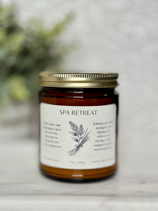 Jar of 'Spa Retreat' candle on a light background